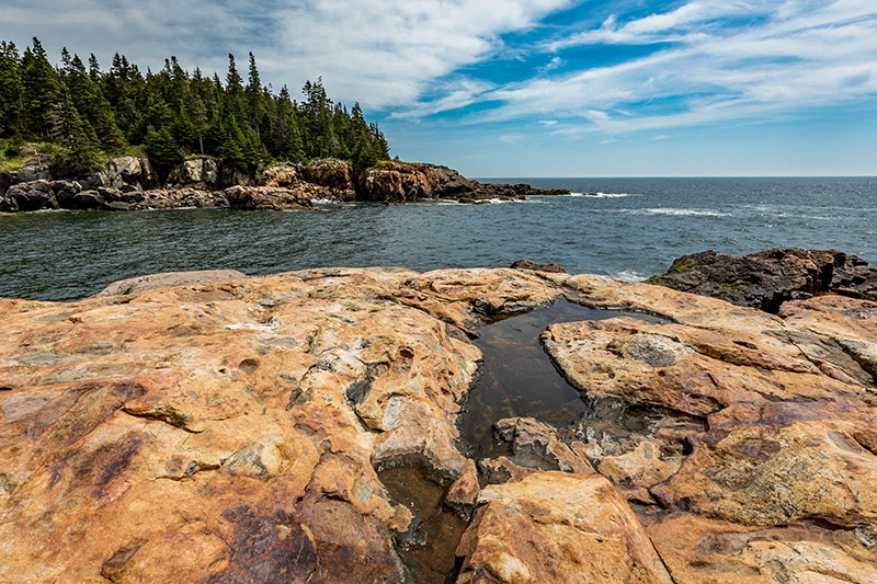 Large rocks to the side of Little Hunters Beach